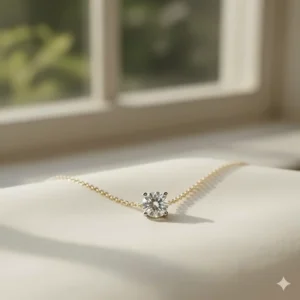 Elegant diamond solitaire pendant on a fine 14k gold necklace chain, perfect for everyday wear.