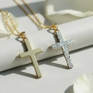 A side-by-side view comparing a plain polished and a diamond-cut style of the 18k gold cross necklace.
