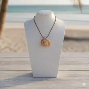 The handmade conch shell necklace displayed on a white jewelry bust to show its flattering length.