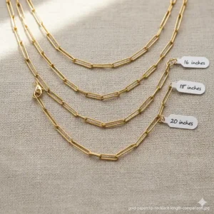 Image showing the gold paperclip chain necklace at its various adjustable lengths (e.g., 16", 18", 20") for fit comparison.