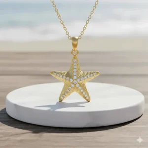 High-quality product image of a gold-plated starfish necklace.