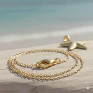 Detail shot showing the sturdy lobster clasp on the starfish necklace chain.