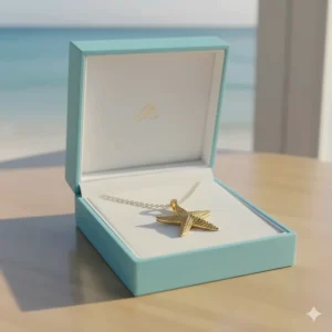 The beautiful starfish necklace packaged securely in a branded jewelry gift box.