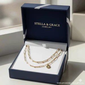 The trendy gold paperclip chain necklace beautifully displayed in its branded luxury gift box, ready for gifting.