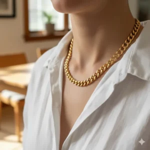 Example of a medium-weight 18k Curb gold chain necklace, detailing its interlocking, uniform links for a slightly bolder look.