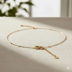 Illustration showing an adjustable gold choker chain with a 2-inch extender for the perfect fit.